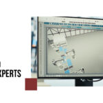 Computer screen displaying 3D mechanical assembly using CAD software